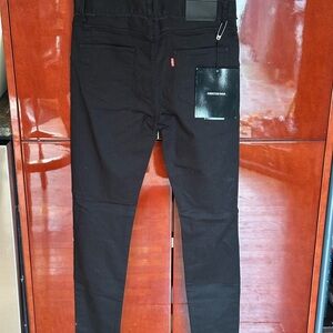 Christian Dada Designer knee damaged super skinny signature trousers